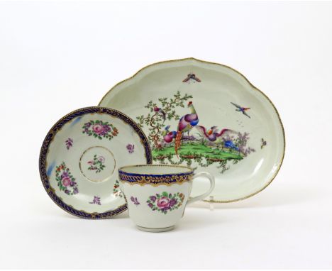 A Worcester dessert dish  c.1780, of kidney shape, painted in polychrome enamels with a peacock and other fancy birds within 