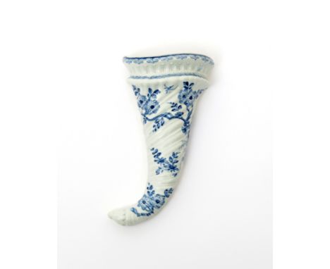 A Worcester blue and white wall pocket  c.1755, the spiral-moulded body of cornucopia form and painted with flowering prunus 