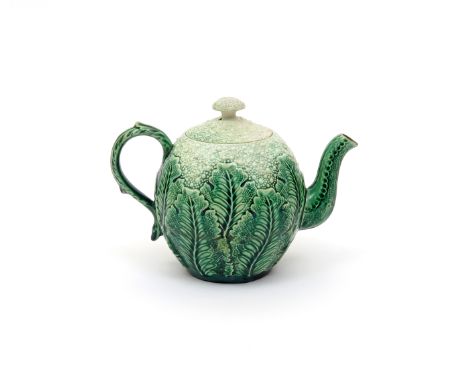 A small creamware cauliflower teapot and cover  late 18th century, modelled with creamy florets to the cover and shoulders, i