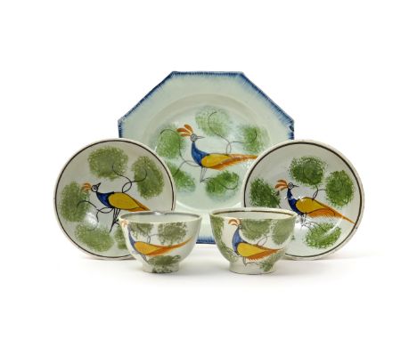 A pair of pearlware 'Peafowl' toy teabowls and saucers  1st half 19th century, and a child's octagonal plate, all decorated i