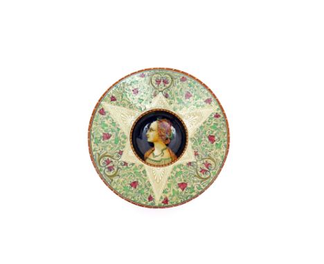 An Italian maiolica portrait dish  early 20th century, Vincenzo Molaroni of Pesaro, the deep well painted with the head and s