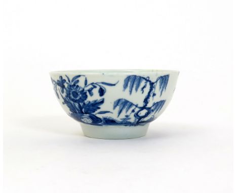 A Worcester blue and white small bowl  c.1755-60, painted with the Landslip pattern, a small building at the bottom of a stee