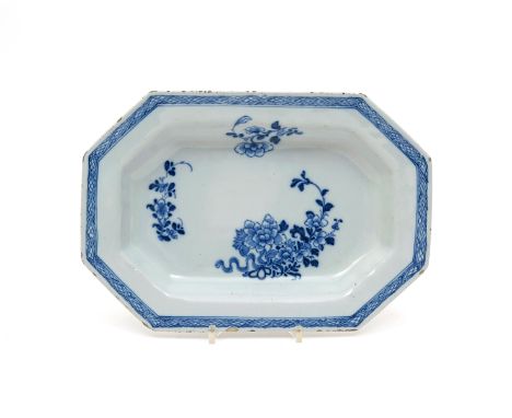 An Irish delftware octagonal dish  c.1760, painted in blue with simple sprays of flowering peony within a hatched diaper bord