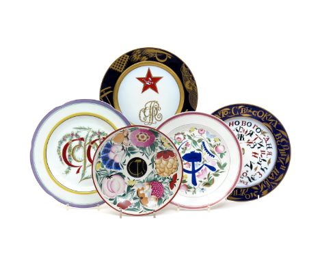 Five Russian porcelain plates with Soviet Propaganda designs  20th century, four after designs by Sergei Chekhonin, one copyi