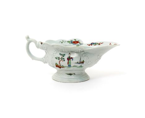 A large and unusual Worcester moulded sauceboat  c.1753-55, of silver shape, two differently moulded panels to the exterior p