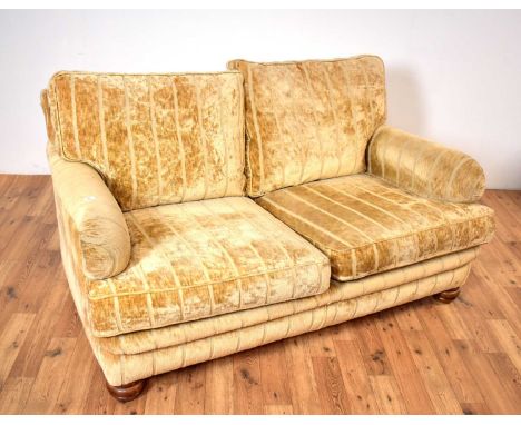 'Duresta Blanchard': A contemporary Duresta two seater sofa, upholstered in tan plush fabric, raised on turned feet, 170 x 11