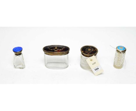 Two early 20th Century cut glass jars with silver and tortoiseshell covers, comprising: oval jar, by Levi &amp; Salaman, Birm