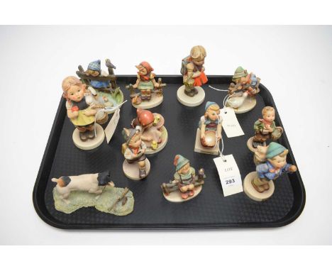 A collection of Hummel figures of children, of various sizes and designs, the largest 14cms high; together with a Border Fine