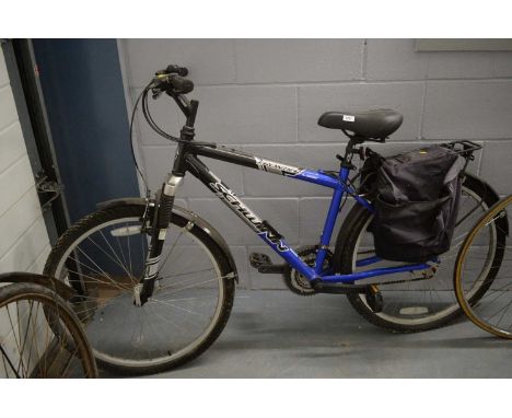 A Schwinn Frontier FS aluminium sport mountain bike, with Shimano brakes, parcel shelf and bag, in blue and black.