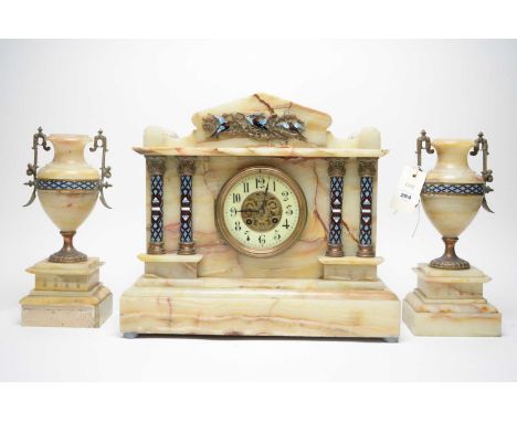 A 19th Century alabaster clock garniture, formed of a central architectural mantel clock and a pair of twin handled urn vases