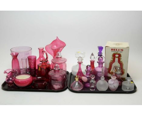 A collection of cranberry, coloured and frosted glass ware, including: LSA scent bottle with stopper; cranberry glass scent b