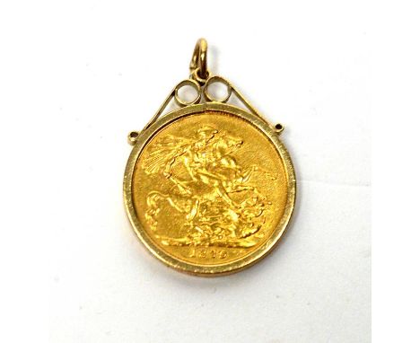 A Queen Victoria gold sovereign, 1879, mint mark M for Melbourne Australia, in 9ct gold pendant mount, 33mm high overall, 9.5