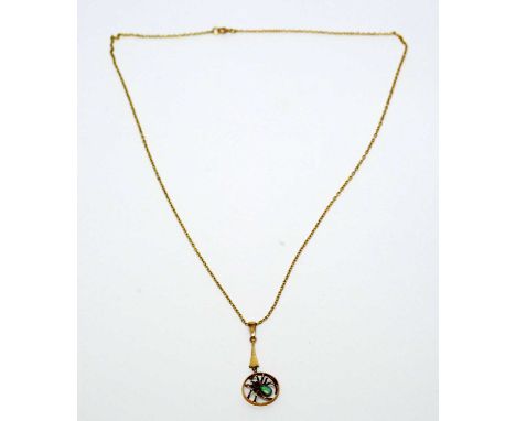 An opal, garnet and gold spider pendant, stamped 9ct to bale, with yellow gold chain necklace, 3.2g gross.