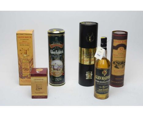 A collection of bottles of whisky, including: Glenmorangie Single Highland Malt Scotch Whisky, 10 Years Old, in tube; Glenmor