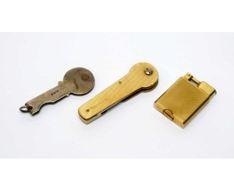 A 9ct yellow gold cigarette lighter, with London import mark 1929, 28.7g gross; together with a 9ct yellow gold cased key mou