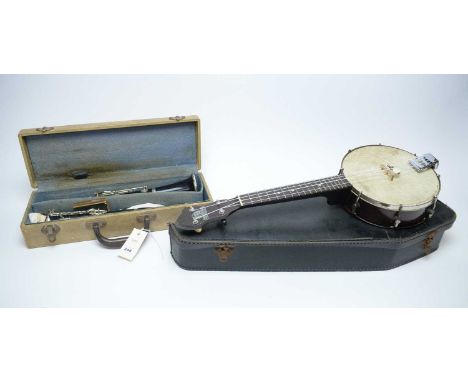 A Console clarinet, in case; together with a George Formby banjo ukulele, in case. (2) 