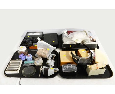 A collection of tools and equipment for jewellery making or repair, including clamp; tweezer set; eye guard; and other items,