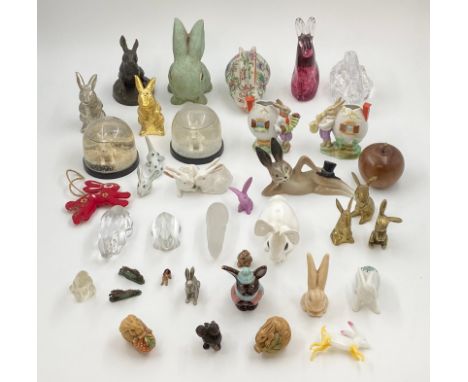 A large and miscellaneous collection of rabbit figures to include two resin and one boxwood signed Netsuke, one signed Donald
