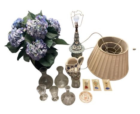 A quantity of decorative items to include lamp, faux Hydrangers, glassware etc 