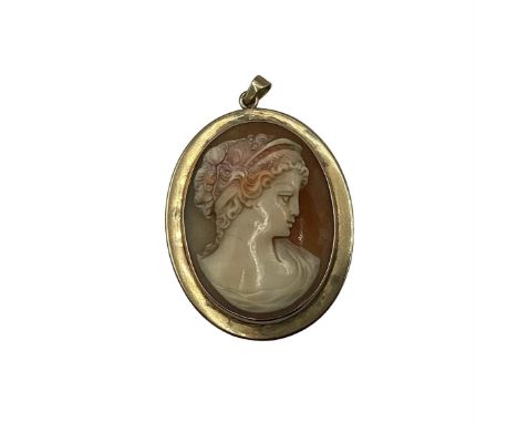 A Cameo locket, with old portrait photo in glass mount verso, engraved to yellow metal rim: from ArthurJune 14 1871 