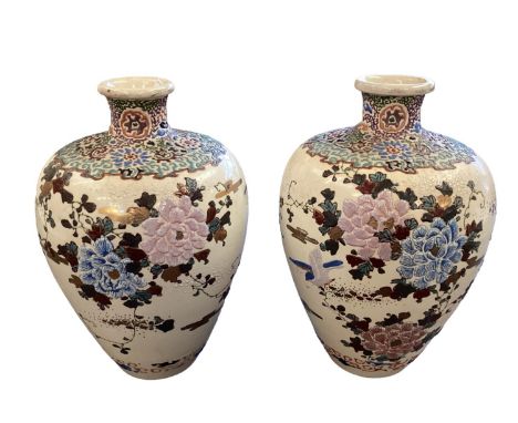 A pair of modern Oriental style baluster shaped vases. 34cm(h). In good order with light signs of wear. 