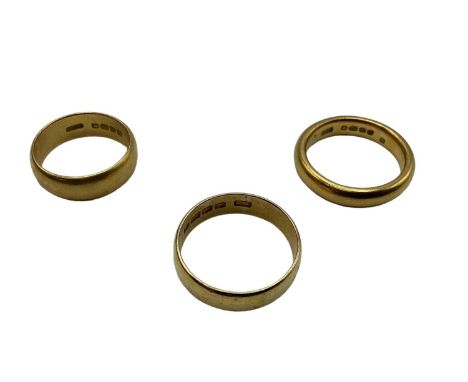 Three 22ct gold wedding bands, 7.5g, size M, K, P 
