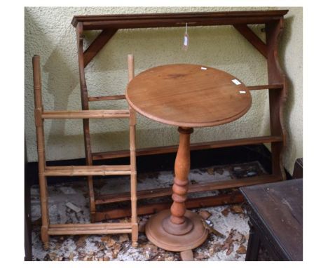 Pine open wall rack of waterfall design with moulded cornice over peg rack, together with a tripod occasional table and three