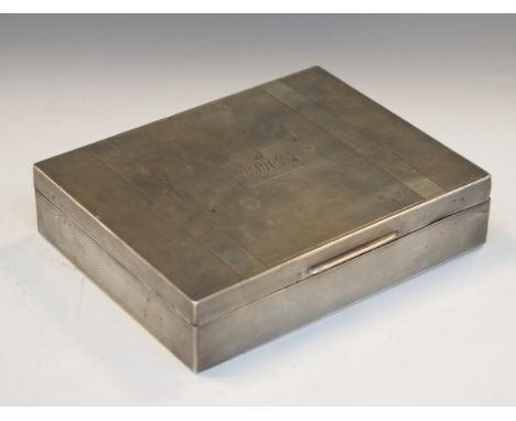 George V silver cigarette box of rectangular form, the hinged cover with central cartouche between raised bands and engine tu