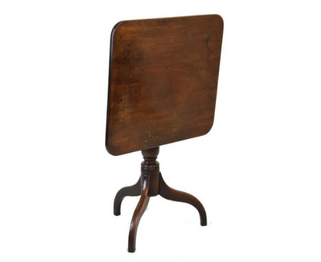 Early 19th Century mahogany snap top tripod occasional table, the rounded oblong top on a caster turned stem and three down c