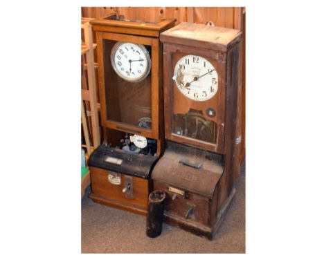 Two early 20th Century clocking-in clocks, the first by National Electric Time Recorder Co Ltd Kent, the second with monogram
