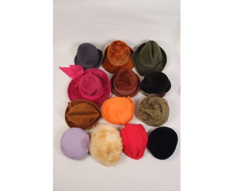 A BOX OF VINTAGE HATS A collection of 1940/50's  hats of all shapes and colours. (quantity) 