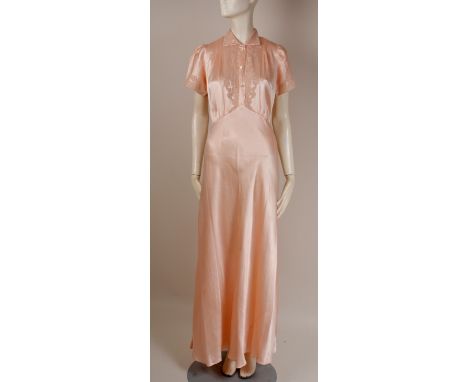 A 1940'S MOSS CREPE SILK NIGHT GOWN A beautiful heavy vintage weight silk in shell pink, long night gown.  Fitted to the wais