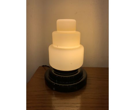 Art Deco table lamp in opaline glass. Circa 1925.Black base with a shade in light ochre opaline triplex glass.Electric, and i