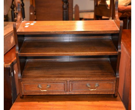 A small mahogany wall shelf with two short drawers, 56cm high, 57cm wide, 23cm deep