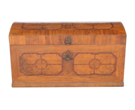 A Continental walnut & olivewood parquetry dome top chest, circa first half 19th century, with carrying handles, 73cm high, 1