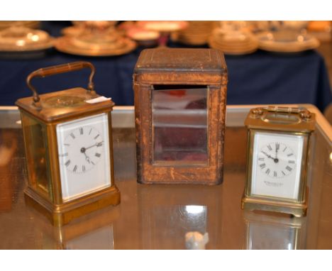 A French brass carriage timepiece, early 20th century, with eight-day movement with platform lever escapement, with white ena