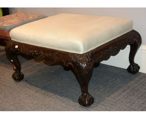 A mahogany and upholstered stool in mid Georgian style, 20th century, 44cm high, the seat 71cm x 58cm