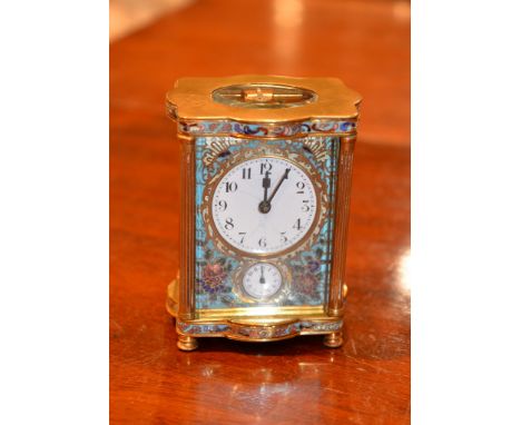 A French lacquered brass and champleve style enamel carriage timepiece with alarm, early 20th century, the eight-day movement