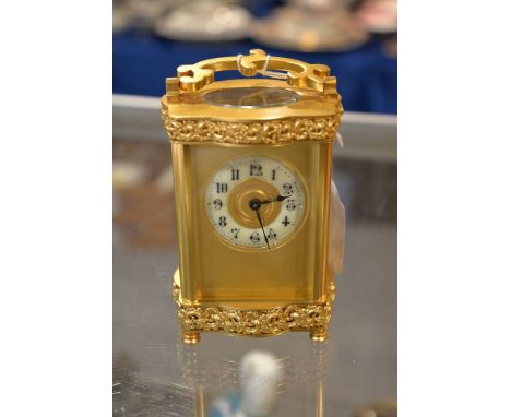 A gilt brass carriage clock, R & Co, 20th century, with platform lever escapement, 13cm high (excluding handle)