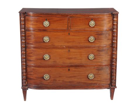 An early 19th century mahogany chest of drawers, with bobbin turned flanking pilasters, 106cm wide