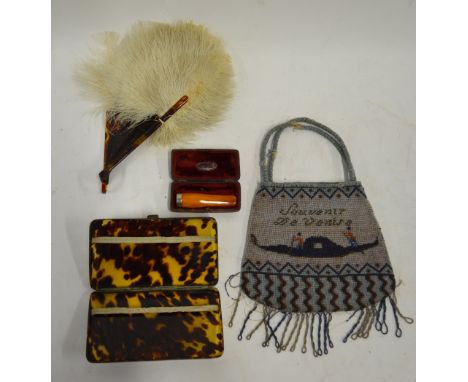 A cased amber cheroot-holder with silver collar to/w a tortoiseshell cigarette case, an ostrich feather fan with tortoiseshel