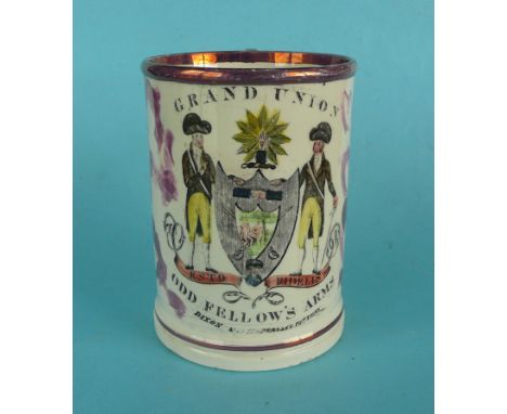 A  pink lustre decorated mug by Dixon & Co of Sunderland Pottery colourfully decorated with a facsimile coat of arms inscribe