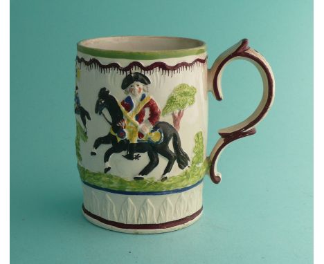 Duke of Cumberland: a small Prattware mug moulded and colourfully decorated with an equestrian portrait and on the reverse a 