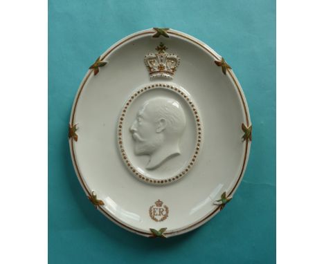 1902 Coronation: an oval porcelain plaque by Hammersley moulded with a crowned profile cartouche signed A. Colclough 1902, th