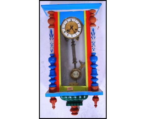 An early 20th century up-cycled wall clock in the manner of Gustav and Becker, the mahogany case being painted in a variety o