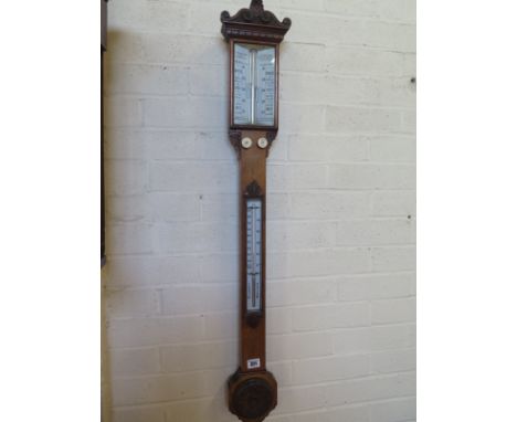 A good quality 19th century oak stick barometer, the dial stamped T. Reed & Son, Cambridge with a thermometer - Height 100cm 