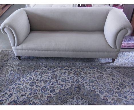 A Victorian Chesterfield sofa re covered in a light fabric - Width 208cm
