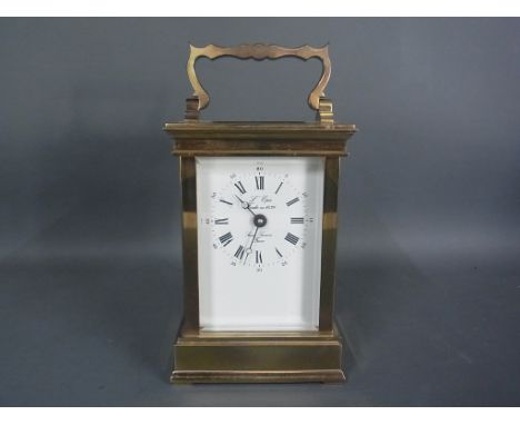 A small good quality carriage clock, the dial signed  L Epee Saine Luxanne France - Height 12cm - no key