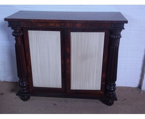 A good quality 19th century rosewood side cabinet with two curtain panel doors opening to reveal adjustable shelf, flanked by