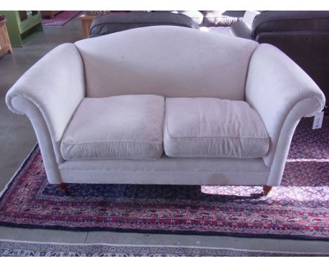 A Laura Ashley cream two seater sofa - Width 170cm